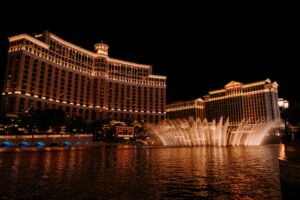 he Bellagio Hotel and its famous fountains illuminated at night in Las Vegas