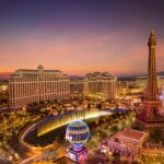 The iconic Las Vegas Strip lit up at night, featuring famous hotels and casinos