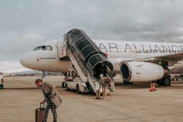 Student at the airport, excited to start their study abroad adventure