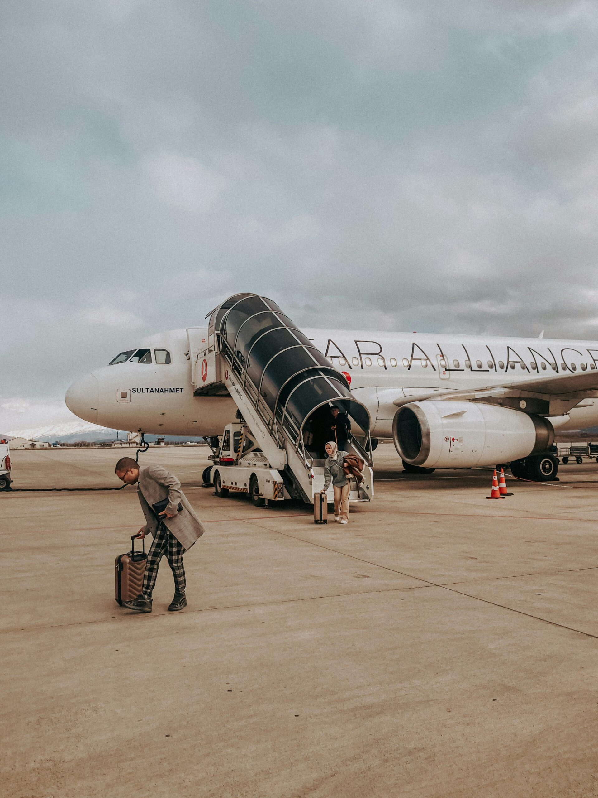 Student at the airport, excited to start their study abroad adventure